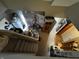 Overhead view of an attic room with slanted ceilings and an array of decor and furniture at 3054 Ruckle St, Indianapolis, IN 46205