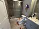 Bathroom featuring a glass-enclosed shower at 3054 Ruckle St, Indianapolis, IN 46205