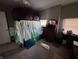 Cozy bedroom with unique canopy bed and abundant natural light at 3054 Ruckle St, Indianapolis, IN 46205
