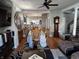 Formal dining room with seating for six, an antique grandfather clock, and hardwood floors at 3054 Ruckle St, Indianapolis, IN 46205