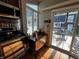 Kitchen with a breakfast nook and a view of the deck through the sliding glass doors at 3054 Ruckle St, Indianapolis, IN 46205