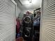 Laundry room with stainless steel washer and dryer, plus built in shelving at 3054 Ruckle St, Indianapolis, IN 46205