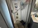 Shower stall with built-in shelves and a small stool; a variety of bath products are stored at 3054 Ruckle St, Indianapolis, IN 46205