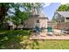 A lovely backyard with grass, patio, and table at 315 W 43Rd St, Indianapolis, IN 46208