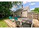 A backyard patio with outdoor dining furniture at 315 W 43Rd St, Indianapolis, IN 46208