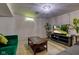 Finished basement features modern lighting, comfortable seating, and a stylish coffee table on a neutral rug at 315 W 43Rd St, Indianapolis, IN 46208