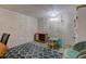 Basement area with shelving, playroom, seating and lots of room to play at 315 W 43Rd St, Indianapolis, IN 46208