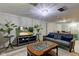 Basement area showcasing a cozy seating area, stylish tables, and a large television for entertainment at 315 W 43Rd St, Indianapolis, IN 46208