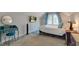 Bedroom with desk, natural light, and neutral carpet at 315 W 43Rd St, Indianapolis, IN 46208