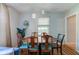 Charming dining room with wood table, stylish wallpaper, and decorative lighting at 315 W 43Rd St, Indianapolis, IN 46208
