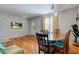 Open-concept living and dining area with hardwood floors and ample natural light at 315 W 43Rd St, Indianapolis, IN 46208