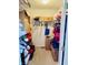 Walk-in closet with wire shelving is neatly filled with boxes and personal items at 3418 S Rosewind Dr, New Palestine, IN 46163