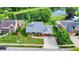 Aerial view showing home, yard, and nearby lake in a residential area at 369 Rodeo Dr, Indianapolis, IN 46217