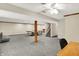 Finished basement featuring versatile recreational space with gray carpeting and recessed lights at 369 Rodeo Dr, Indianapolis, IN 46217