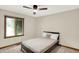 Serene bedroom with natural light, neutral décor, and comfortable furnishings at 369 Rodeo Dr, Indianapolis, IN 46217