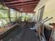 Enclosed back porch with a table and chairs at 3709 N Layman Ave, Indianapolis, IN 46218