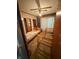This bedroom offers twin beds and a ceiling fan at 3709 N Layman Ave, Indianapolis, IN 46218