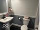 Bathroom featuring a modern toilet and pedestal sink with trim detail at 3815 Briar Rdg, Monrovia, IN 46157