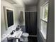 Bathroom with combined shower and tub featuring a vanity, toilet, and shower at 3815 Briar Rdg, Monrovia, IN 46157