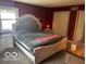 Bedroom featuring carpet, bright natural light, and a decorative headboard at 3815 Briar Rdg, Monrovia, IN 46157