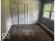 Bedroom featuring carpet, window, and large, bright closet at 3815 Briar Rdg, Monrovia, IN 46157