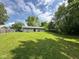 Expansive backyard featuring a well-maintained lawn and privacy fence, perfect for outdoor activities at 4405 Phoenix Dr, Indianapolis, IN 46241