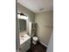Bathroom featuring a vanity, toilet, cabinet, mirror, and shower/tub combo at 4405 Phoenix Dr, Indianapolis, IN 46241