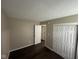 Bedroom featuring hardwood floors, a closet, and neutral paint at 4405 Phoenix Dr, Indianapolis, IN 46241