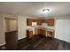 Functional kitchen with brown cabinetry, modern appliances, and hardwood floors, perfect for everyday living at 4405 Phoenix Dr, Indianapolis, IN 46241