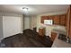 Functional kitchen with brown cabinetry, modern appliances, and hardwood floors, perfect for everyday living at 4405 Phoenix Dr, Indianapolis, IN 46241