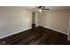 Inviting living room featuring hardwood floors and neutral paint, creating a warm and spacious atmosphere at 4405 Phoenix Dr, Indianapolis, IN 46241