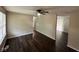 Inviting living room featuring hardwood floors and neutral paint, creating a warm and spacious atmosphere at 4405 Phoenix Dr, Indianapolis, IN 46241