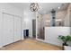 Bright bathroom showcasing a glass shower and a modern sink and cabinet at 4465 W Woodbridge Ln, New Palestine, IN 46163