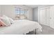 Bright bedroom with natural light, double closets and neutral carpet at 4465 W Woodbridge Ln, New Palestine, IN 46163