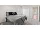 Cozy bedroom with neutral carpet, double closet and door to ensuite bath at 4465 W Woodbridge Ln, New Palestine, IN 46163