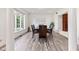 Bright dining room with a view of a window at 4465 W Woodbridge Ln, New Palestine, IN 46163
