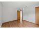 This spacious bedroom has wood flooring, a closet, and a window for natural light at 4609 Framington Ct, Indianapolis, IN 46254