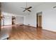 Bright and airy living room featuring wood flooring, stone fireplace, and plenty of open space at 4609 Framington Ct, Indianapolis, IN 46254