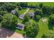 Sprawling property with multiple structures, lush greenery and gardens in a peaceful, rural setting at 5081 N 500 W, Fairland, IN 46126