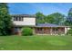 Charming brick and vinyl two-story home with a covered front porch and spacious lawn at 5081 N 500 W, Fairland, IN 46126