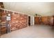 Covered patio with brick walls and tiled flooring at 5081 N 500 W, Fairland, IN 46126