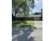 Charming brick home with a well-maintained lawn and mature trees providing ample shade at 5453 David St, Indianapolis, IN 46226