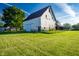 Exterior view of barn and well pump in a rural setting at 6012 N 200 W, Greenfield, IN 46140