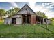 Rustic metal barn featuring an open doorway, perfect for storage at 6012 N 200 W, Greenfield, IN 46140