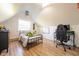 Bedroom has a bed, desk, dresser, and a whiteboard with natural lighting at 6012 N 200 W, Greenfield, IN 46140