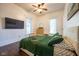 This bedroom boasts lots of natural light and inviting furnishings with a tv at 6012 N 200 W, Greenfield, IN 46140