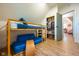 Charming bedroom with bunk beds, closet, and wood-look floors at 6012 N 200 W, Greenfield, IN 46140