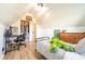 A cozy bedroom features a desk, closet, and a comfortable bed, maximizing space in a charming setting at 6012 N 200 W, Greenfield, IN 46140