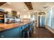 Well-designed kitchen offering an island, stainless steel refrigerator, and ample counter space at 6012 N 200 W, Greenfield, IN 46140