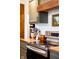 Kitchen with stainless steel appliances, painted cabinets, wood countertops, and wood accents at 6012 N 200 W, Greenfield, IN 46140